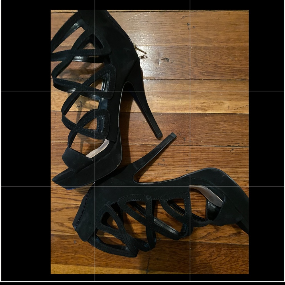 Black heels still in good condition has a zipper in the back size 7 1/2  suede